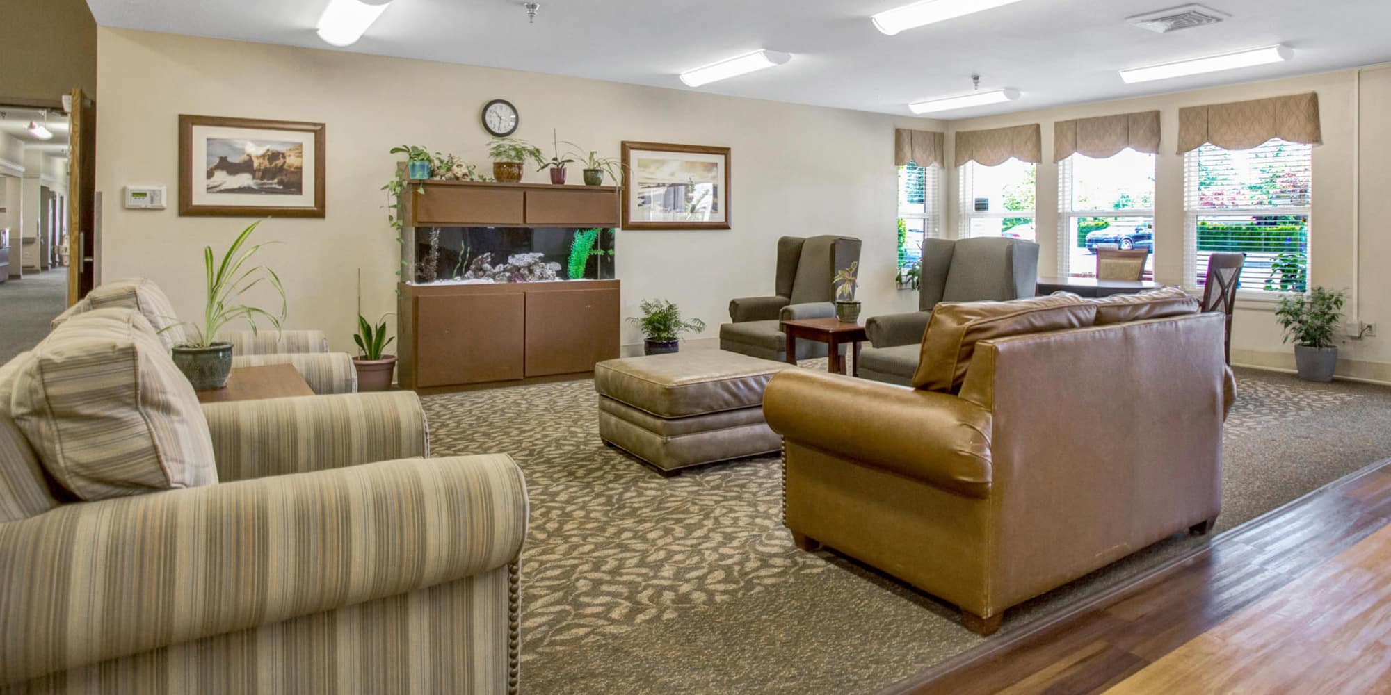 Common room with couches at Forest Grove Post Acute